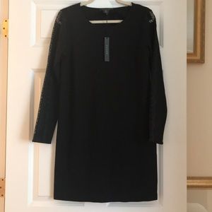 dress by Tahari black with lace on arms.